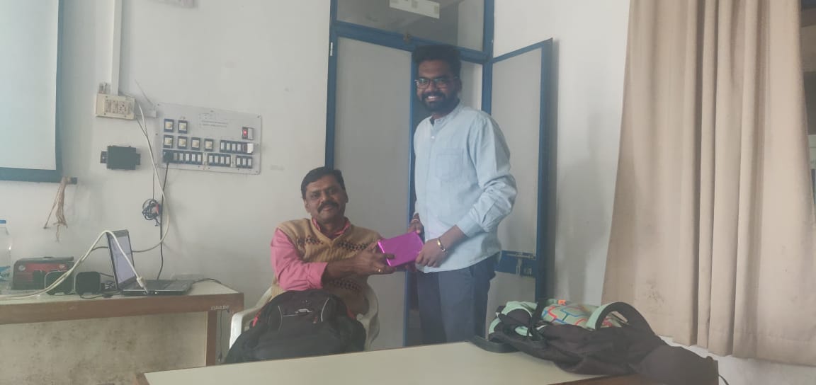 Presenting Gifts to the students of the department who participated in NSS Camp.